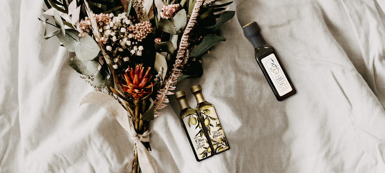  Bouquet of flowers and custom olive oil and balsamic wedding favours from Della Terra.