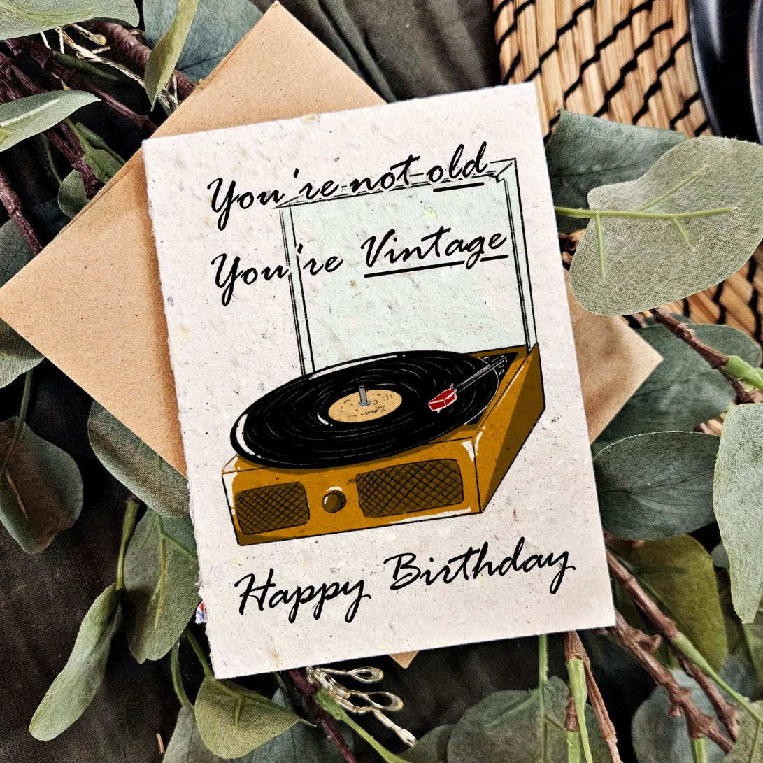 Birthday plantable greeting card with a turntable illustration and text that says 